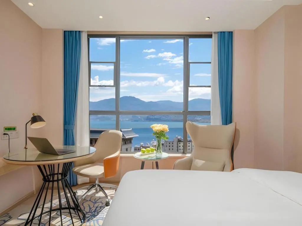 Bed in Vienna Hotel Yunnan Dali Erhai Lake