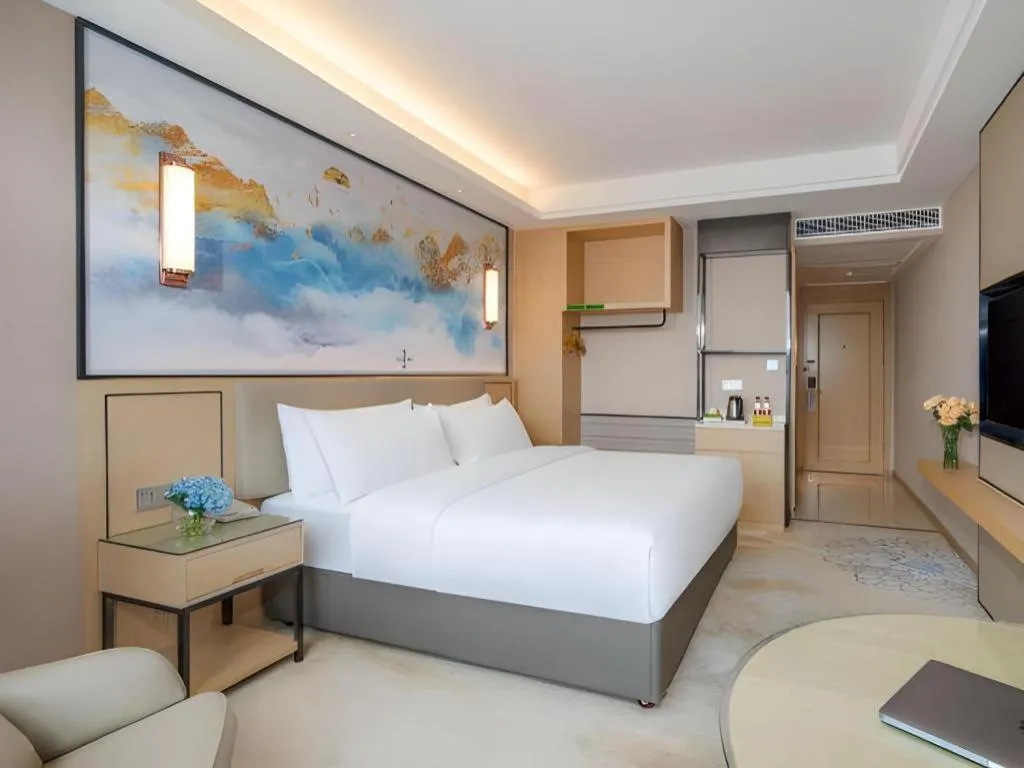 Bed in Vienna Hotel Yunnan Dali Erhai Lake