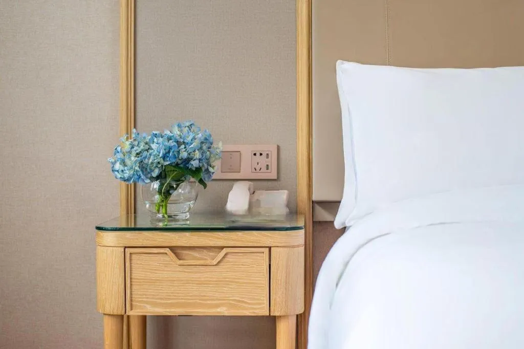 Bed in Vienna Hotel Yunnan Dali Erhai Lake