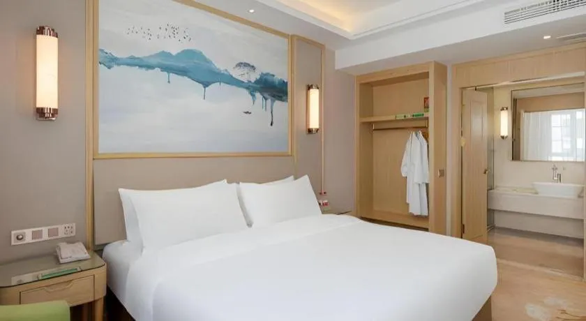 Bed in Vienna Hotel Yunnan Dali Erhai Lake