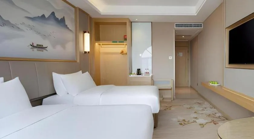 Bed in Vienna Hotel Yunnan Dali Erhai Lake