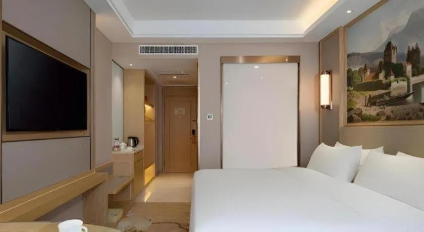 Bed in Vienna Hotel Yunnan Dali Erhai Lake