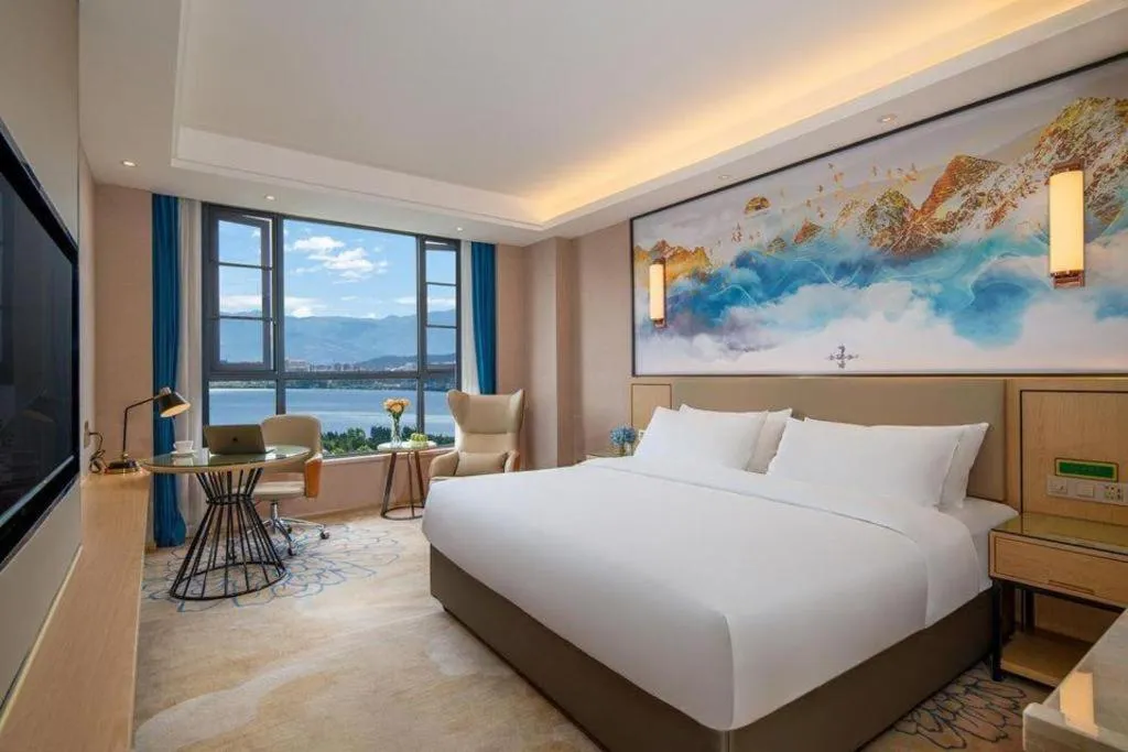 Bed in Vienna Hotel Yunnan Dali Erhai Lake