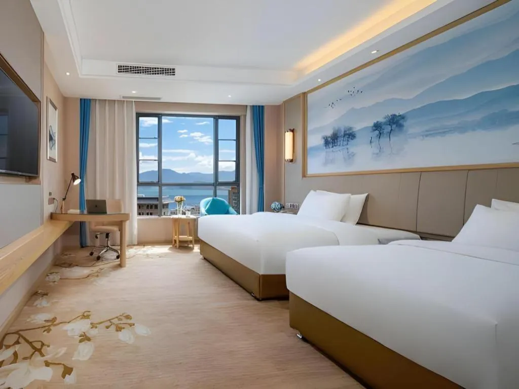 Bed in Vienna Hotel Yunnan Dali Erhai Lake