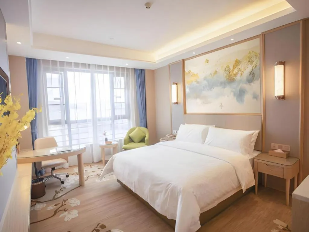 Bed in Vienna Hotel Yunnan Dali Erhai Lake