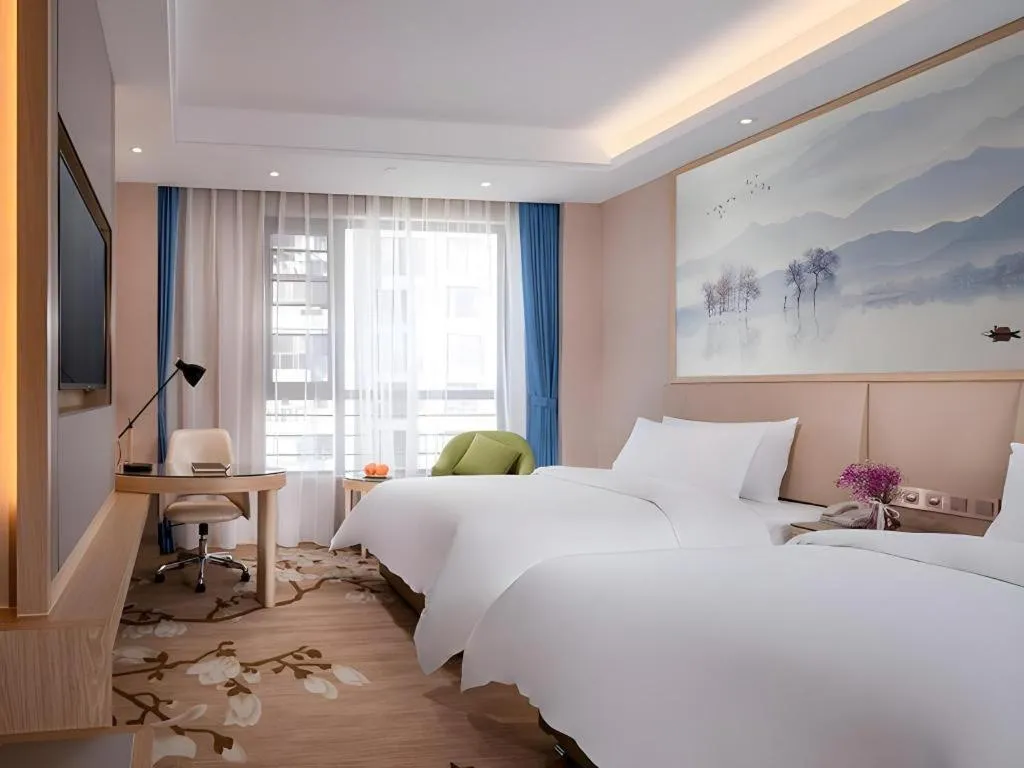 Bed in Vienna Hotel Yunnan Dali Erhai Lake