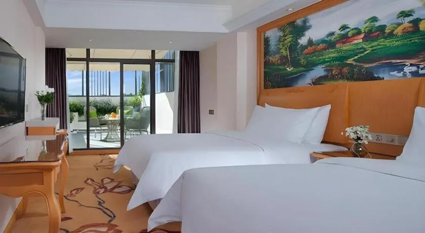 Bed in Vienna Hotel Kunming Beijing Road Chuanxin Gulou Metro Station