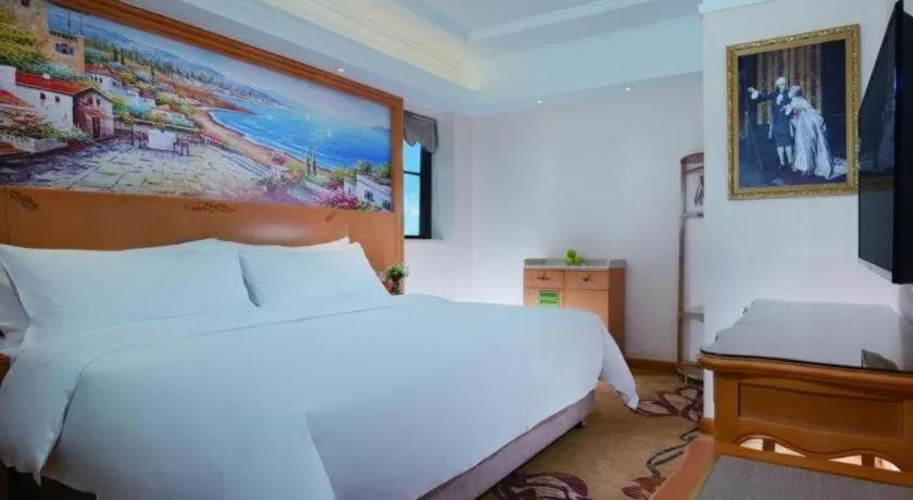 Bed in Vienna Hotel Kunming Beijing Road Chuanxin Gulou Metro Station