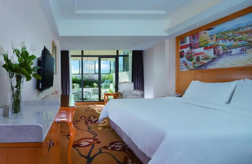 Bed in Vienna Hotel Kunming Beijing Road Chuanxin Gulou Metro Station