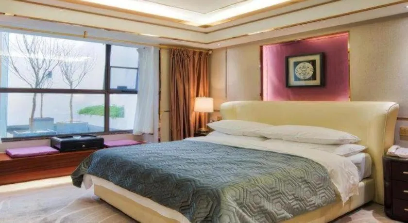 Bed in Vienna Hotel Kunming Beijing Road Chuanxin Gulou Metro Station