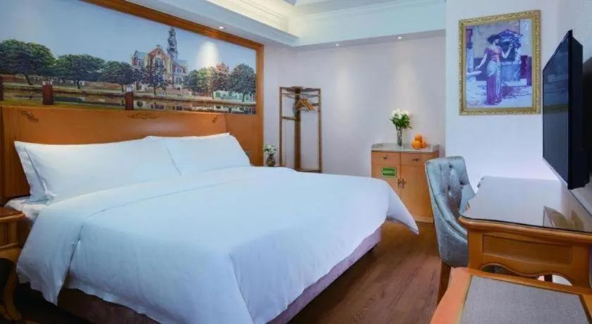 Bed in Vienna Hotel Kunming Beijing Road Chuanxin Gulou Metro Station