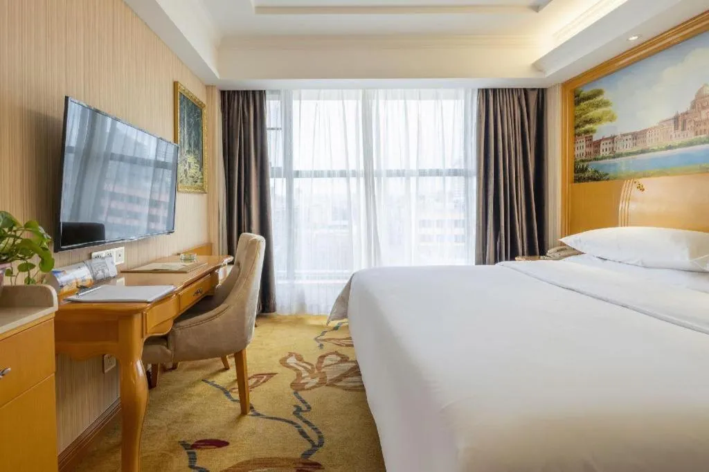 Bed in Vienna Hotel Kunming Beijing Road Chuanxin Gulou Metro Station