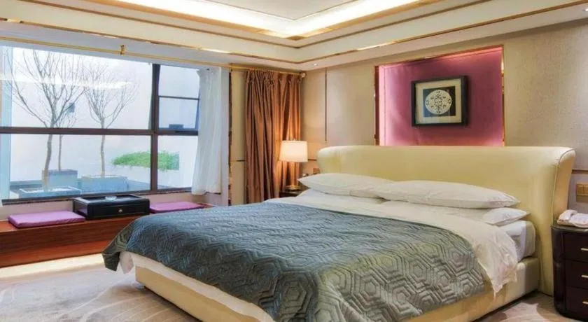 Bed in Vienna Hotel Kunming Beijing Road Chuanxin Gulou Metro Station