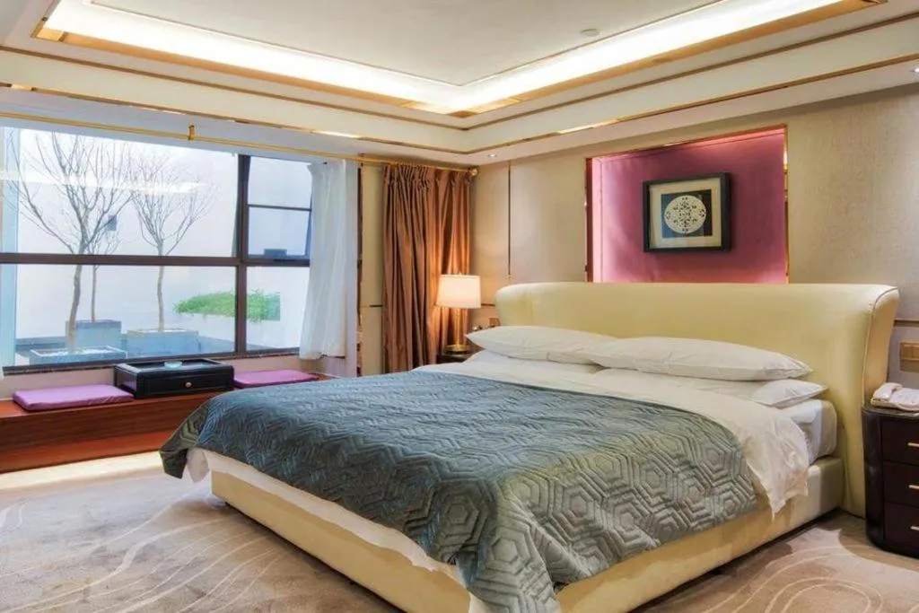 Bed in Vienna Hotel Kunming Beijing Road Chuanxin Gulou Metro Station