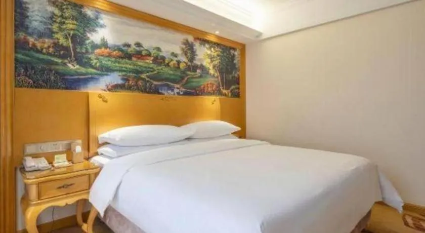 Bed in Vienna Hotel Kunming Beijing Road Chuanxin Gulou Metro Station