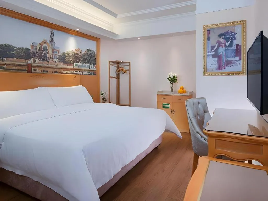 Bed in Vienna Hotel Kunming Beijing Road Chuanxin Gulou Metro Station