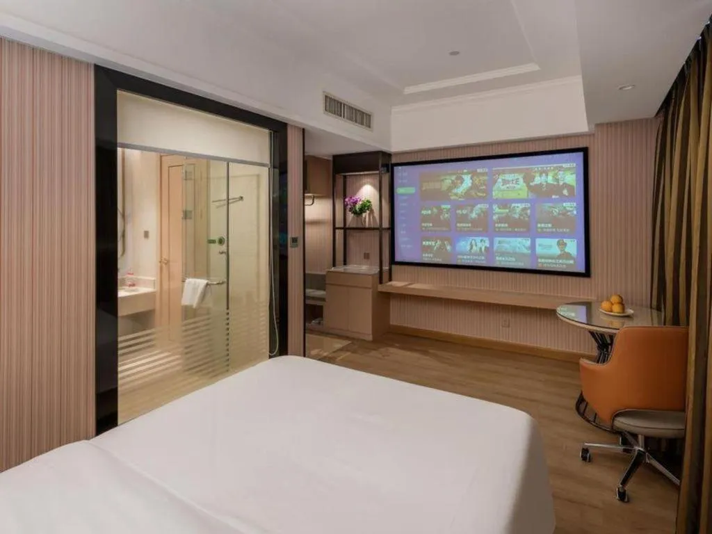Bed in Vienna Hotel Ganzhou Economic Development Zone 1st Hospital West High-Speed Railway Station