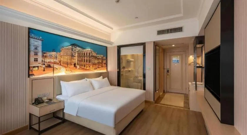Bed in Vienna Hotel Ganzhou Economic Development Zone 1st Hospital West High-Speed Railway Station
