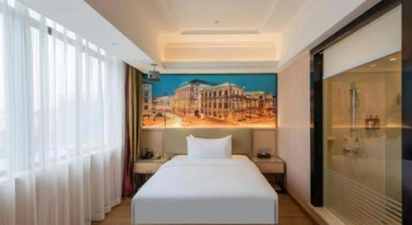 Bed in Vienna Hotel Ganzhou Economic Development Zone 1st Hospital West High-Speed Railway Station
