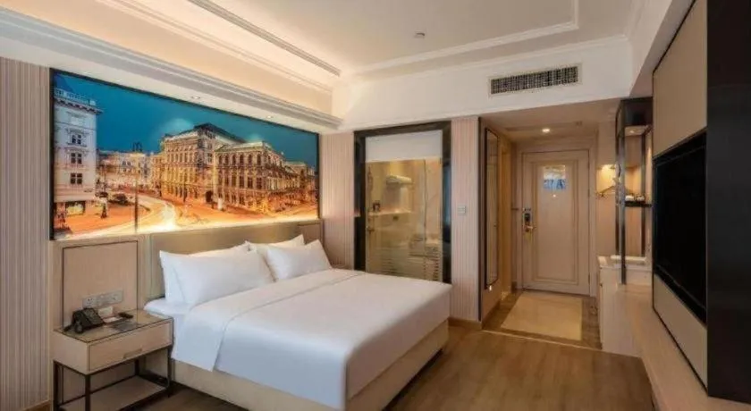 Bed in Vienna Hotel Ganzhou Economic Development Zone 1st Hospital West High-Speed Railway Station