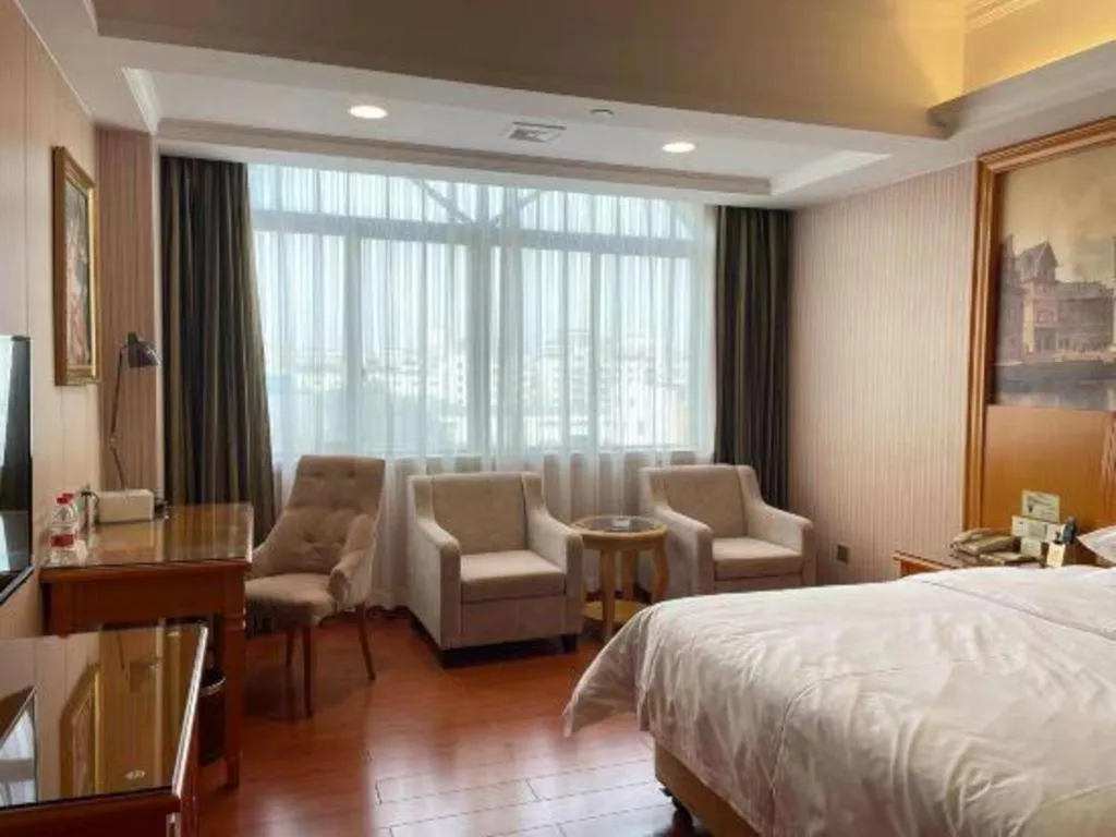 Bed in Vienna Hotel Ganzhou Economic Development Zone 1st Hospital West High-Speed Railway Station