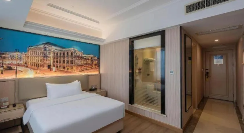 Bed in Vienna Hotel Ganzhou Economic Development Zone 1st Hospital West High-Speed Railway Station