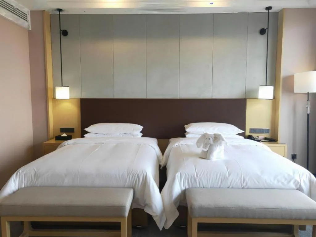 Bed in Venus Royal Hotel Ordos Yijinhuoluo Banner Olympic