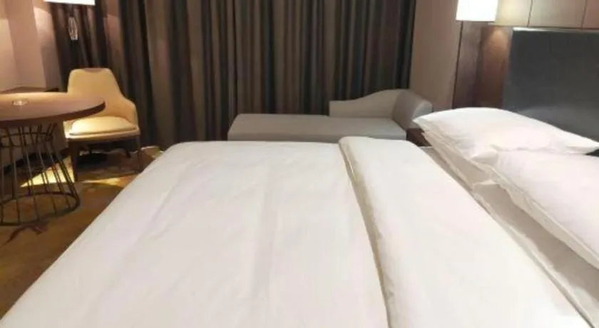 Bed in Venus Royal Hotel Ordos Yijinhuoluo Banner Olympic