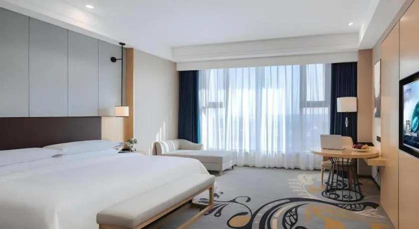 Bed in Venus Royal Hotel Ordos Yijinhuoluo Banner Olympic