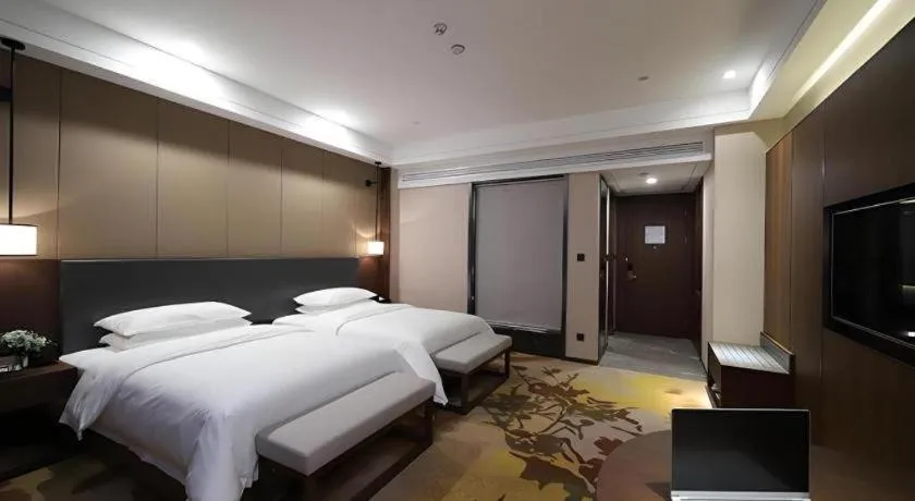 Bed in Venus Royal Hotel Ordos Yijinhuoluo Banner Olympic