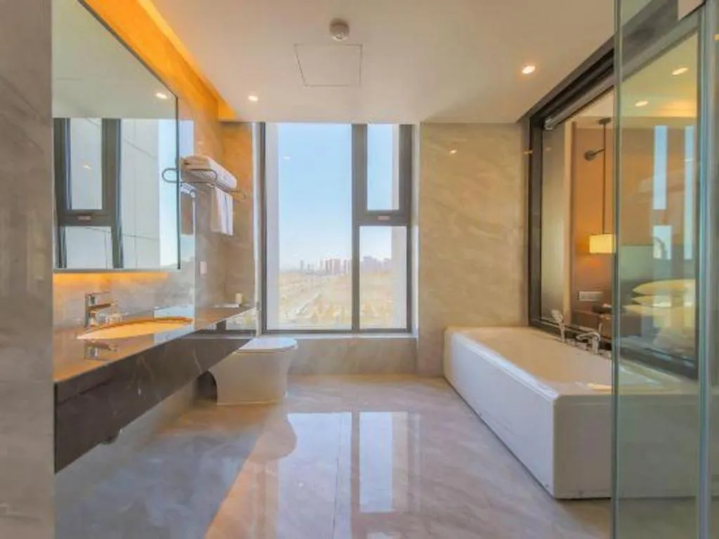 Bed in Venus Royal Hotel Ordos Yijinhuoluo Banner Olympic