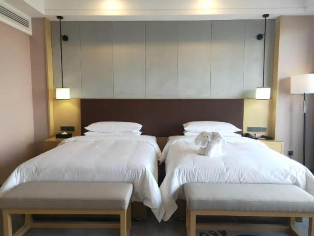 Bed in Venus Royal Hotel Ordos Yijinhuoluo Banner Olympic