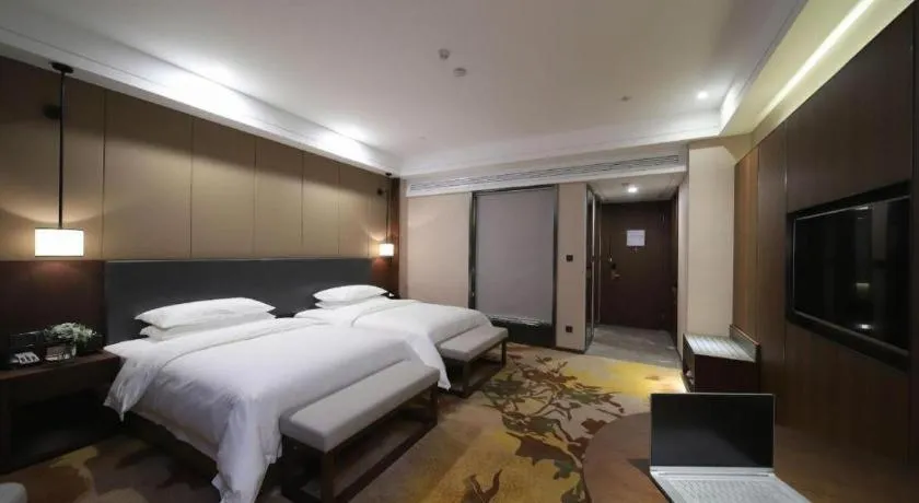 Bed in Venus Royal Hotel Ordos Yijinhuoluo Banner Olympic