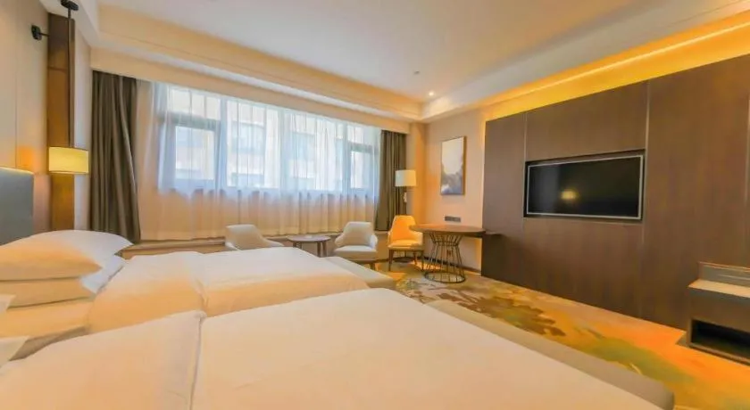 Bed in Venus Royal Hotel Ordos Yijinhuoluo Banner Olympic