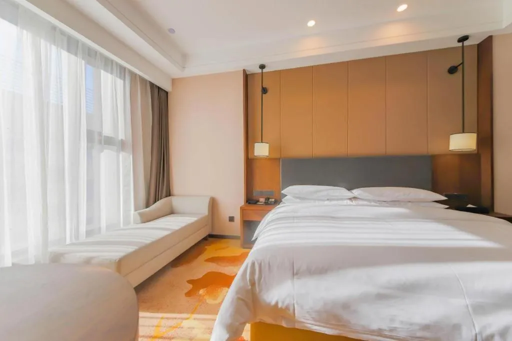 Bed in Venus Royal Hotel Ordos Yijinhuoluo Banner Olympic