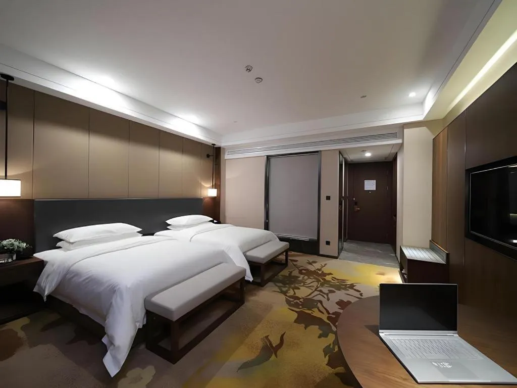 Bed in Venus Royal Hotel Ordos Yijinhuoluo Banner Olympic