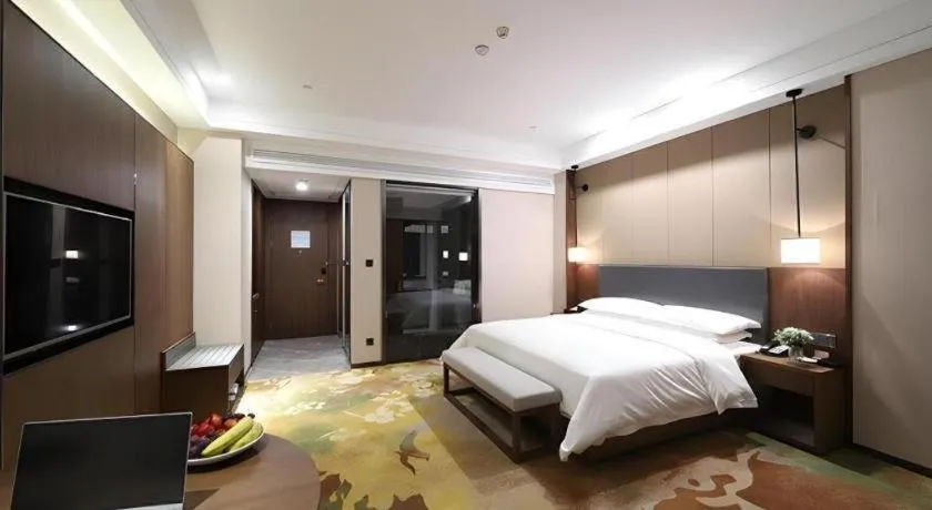 Bed in Venus Royal Hotel Ordos Yijinhuoluo Banner Olympic