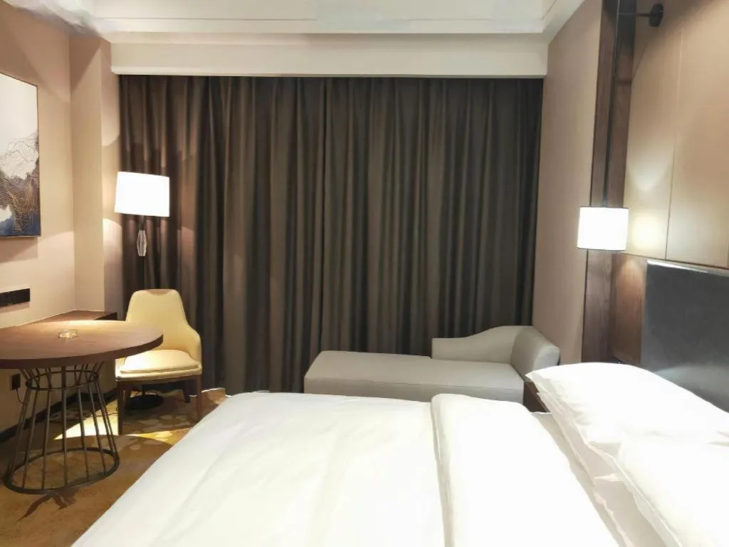 Bed in Venus Royal Hotel Ordos Yijinhuoluo Banner Olympic