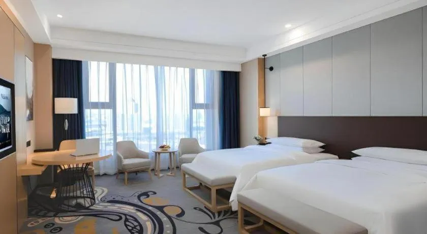 Bed in Venus Royal Hotel Ordos Yijinhuoluo Banner Olympic