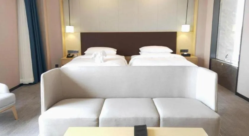 Bed in Venus Royal Hotel Ordos Yijinhuoluo Banner Olympic