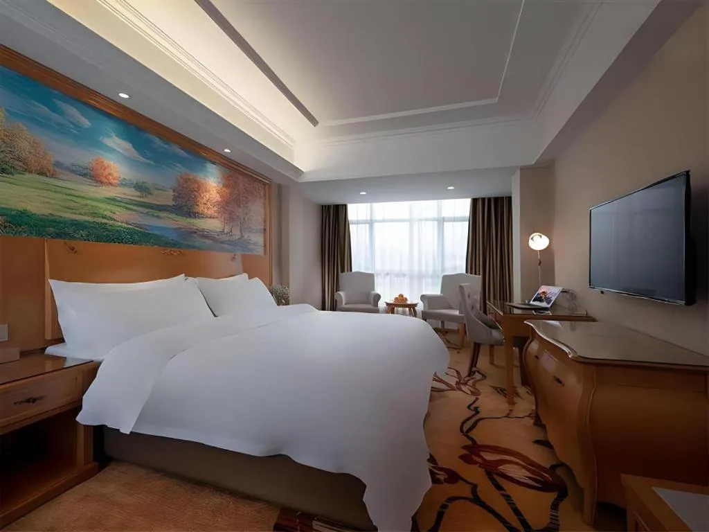 Bed in Vienna Hotel Guangdong Shaoguan Renhua Danxiashan County Center
