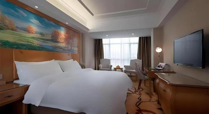 Bed in Vienna Hotel Guangdong Shaoguan Renhua Danxiashan County Center