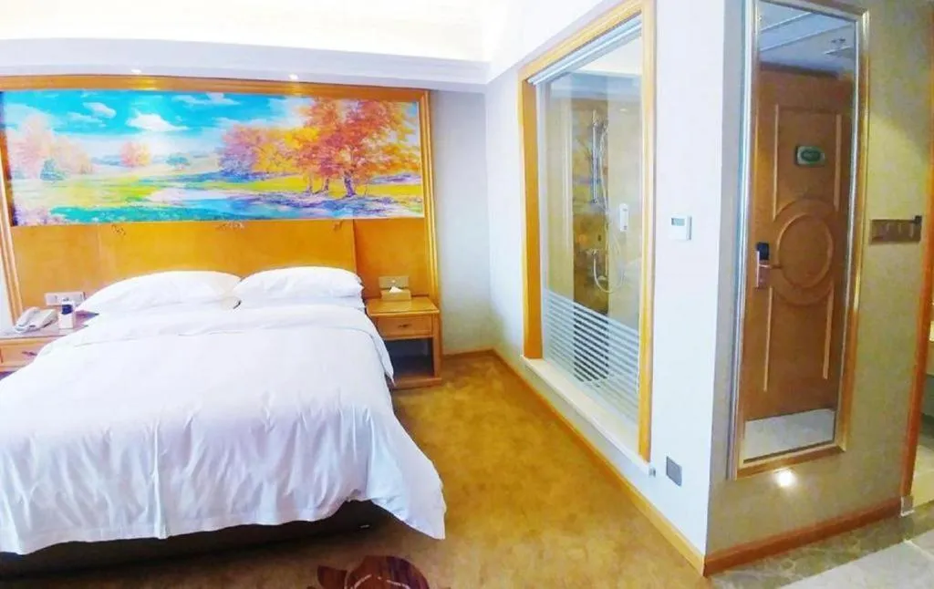 Bed in Vienna Hotel Guangdong Shaoguan Renhua Danxiashan County Center