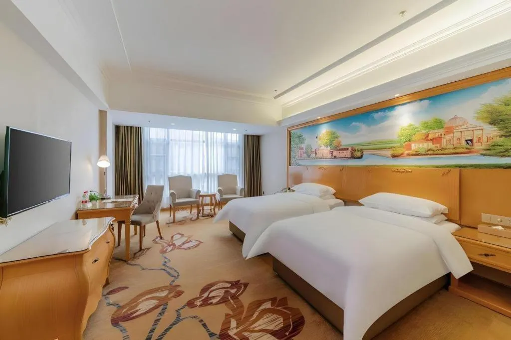 Bed in Vienna Hotel Guangdong Shaoguan Renhua Danxiashan County Center