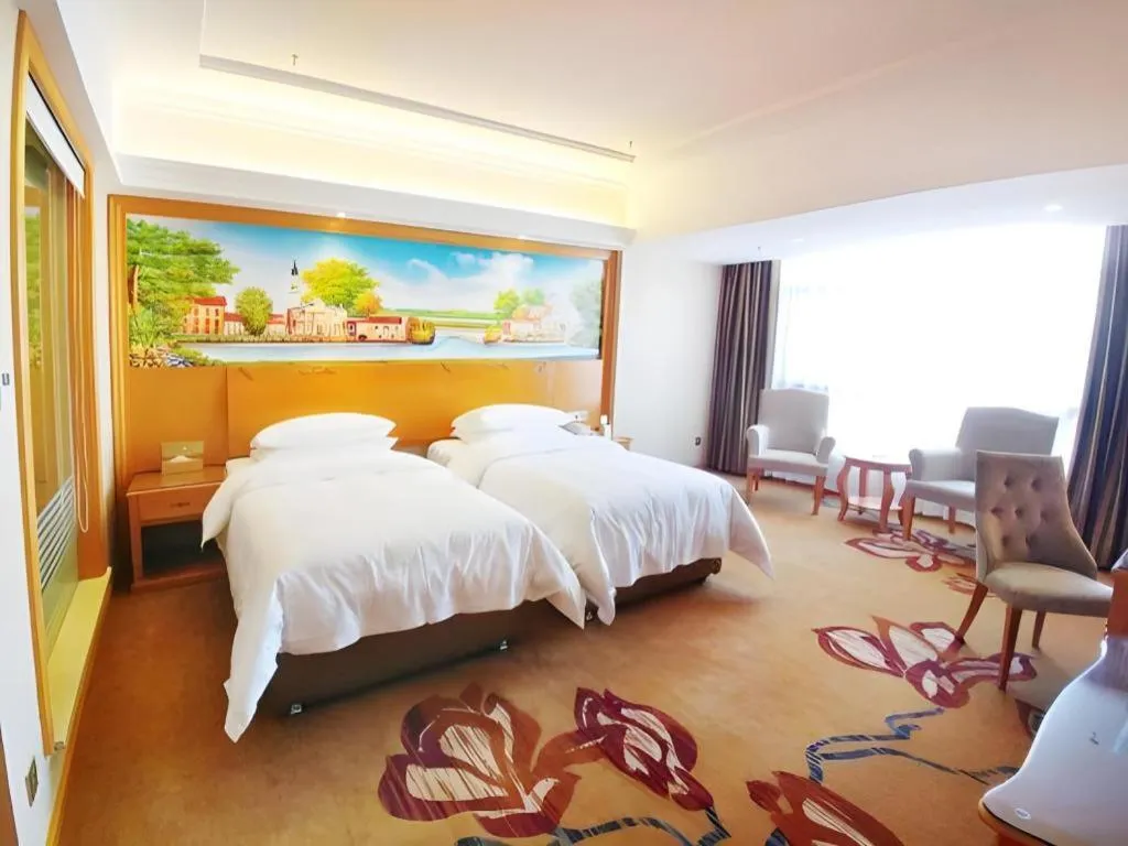 Bed in Vienna Hotel Guangdong Shaoguan Renhua Danxiashan County Center
