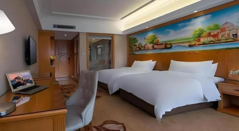 Bed in Vienna Hotel Guangdong Shaoguan Renhua Danxiashan County Center