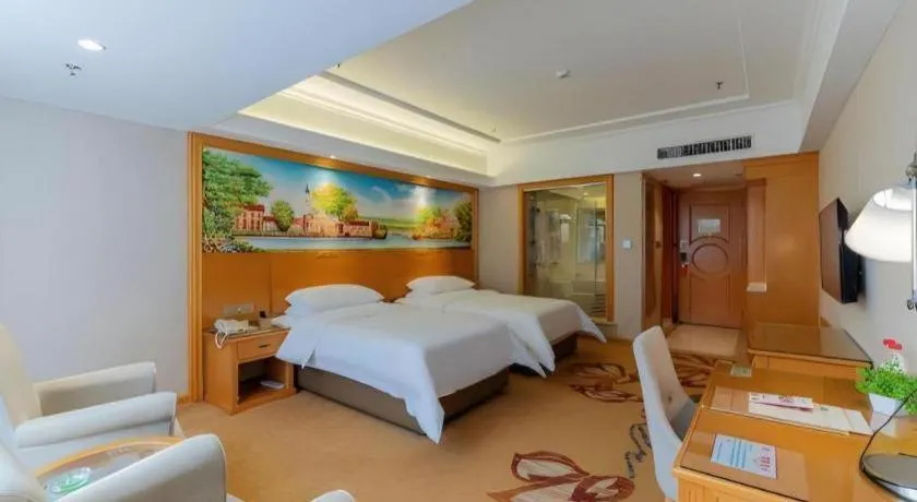Bed in Vienna Hotel Guangdong Shaoguan Renhua Danxiashan County Center