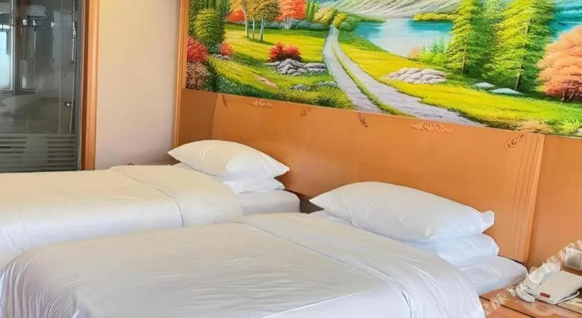 Bed in Vienna Hotel Guangdong Shaoguan Renhua Danxiashan County Center