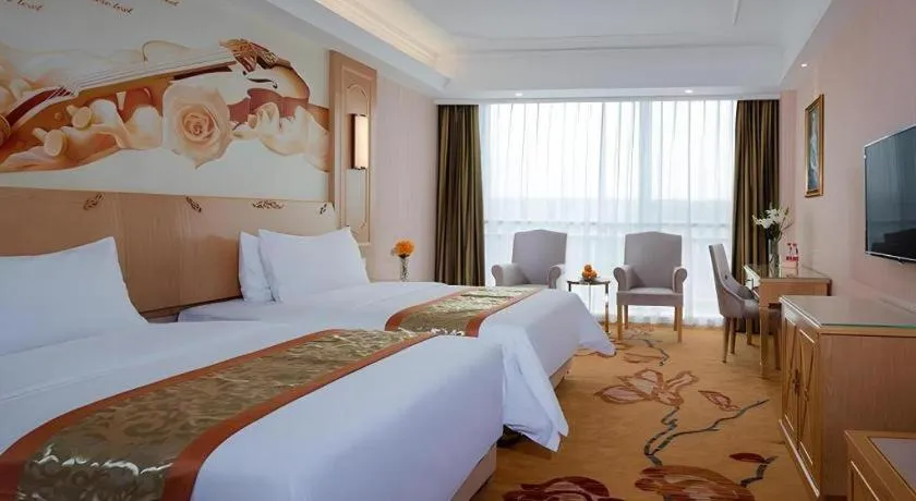 Bed in Vienna Hotel Chengdu Chadianzi Toursim Center