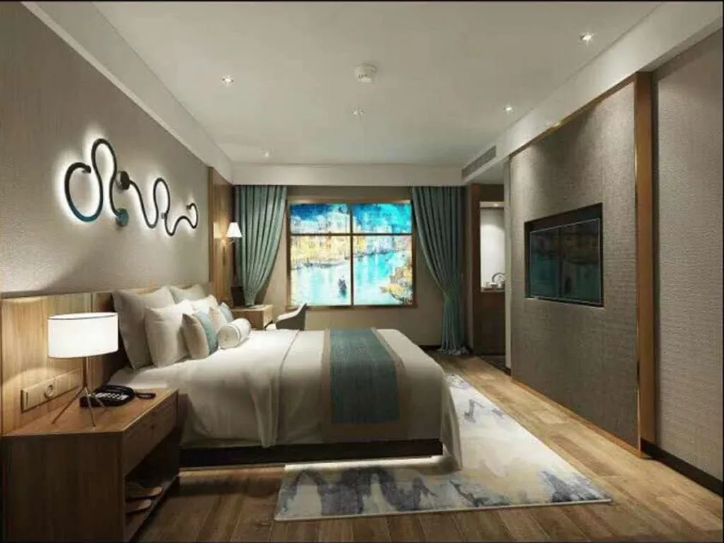 Bed in Vienna Hotel Chengdu Chadianzi Toursim Center